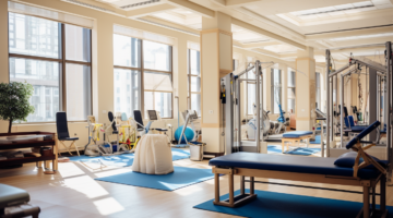 Physical therapy room with diverse exercise equipment